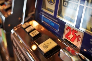 Arcade Games interface on mobile showing game tiles and account balance
